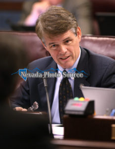 Nevada Assemblyman Chris Edwards, R-Las Vegas, works in committee at the Legislative Building, in Carson City, Nev., on Wednesday, Feb. 18, 2015. Photo by Cathleen Allison