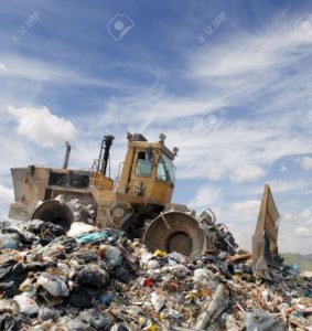 5197897-The-bulldozer-buries-food-and-industrial-wastes-Stock-Photo-landfill-garbage-pollution